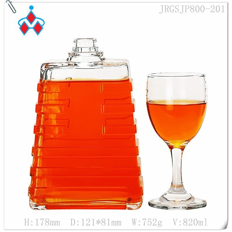 Clear Glass Whisky Bottle